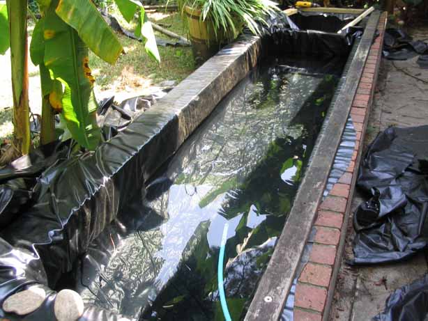 sectioning the pond and installing the new liner